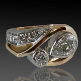 Granny-style uneven ring made of gold and silver with zircon