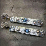 Handmade earrings with blue stone