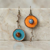 Asymmetrical vintage earrings in antique bronze with graphite