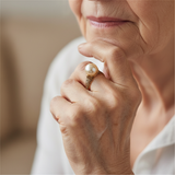 A golden vintage ring with a pearl