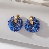 Pair of bohemian handcrafted earrings with beads