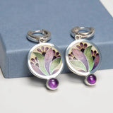Boho earrings with purple crystals in silver