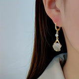 Moonstone earrings with a sparkling sheen