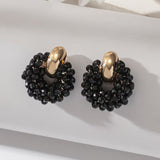 Pair of bohemian handcrafted earrings with beads