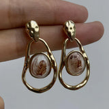 Golden Pendant Earrings with White Uneven Stone