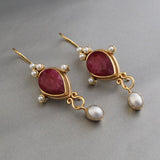 Vintage earrings with ruby and pearl
