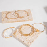 Elegant Set of Tied Bracelets