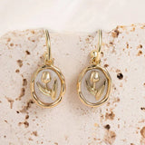Pink vintage earrings with white and gold