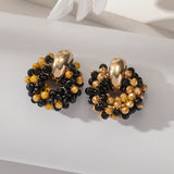 Pair of bohemian handcrafted earrings with beads