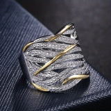 Elegant ring with multiple intertwining layers