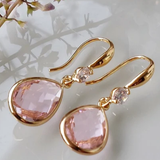Classic drop earrings with a pink crystal