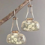 Vintage earrings with aged stone