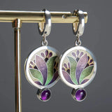 Boho earrings with purple crystals in silver