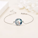 Adjustable silver bracelet with a dog charm