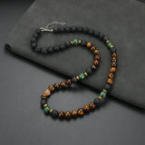 Luxury necklace with tiger eye beads and a gold clasp