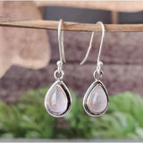Vintage earrings with white pendant