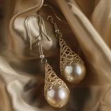 Golden teardrop earring