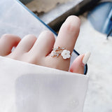 Adjustable ring with wild flower and zirconia in gold