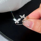 Adjustable silver ring with a sparkling butterfly