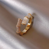 Adjustable Luxurious Ring with White Opal in Gold