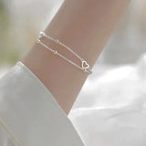 Adjustable Silver Bracelet with a Heart