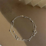 Adjustable Silver Bracelet with a Heart