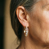 Elegant earrings with a gold finish