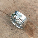 An old-fashioned silver ring in the shape of a heart