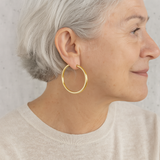 Large gold hoop earrings