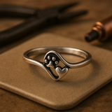 Vintage silver ring with a foot and a heart