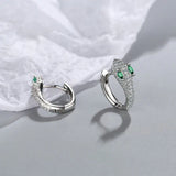 Silver earrings designed as a snake