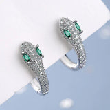 Silver earrings designed as a snake