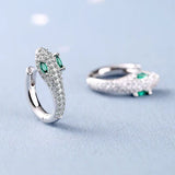 Silver earrings designed as a snake