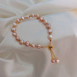 Pink pearl hailstorm golden bracelet
