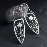 Silver earrings with a lotus flower