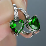 Heart-shaped emerald earrings