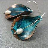 Vintage earrings with blue leaf