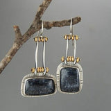 Vintage silver earrings with black stone