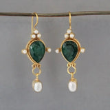 Vintage earrings with ruby and pearl