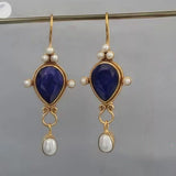 Vintage earrings with ruby and pearl