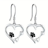 Silver earrings with heart and paw print design