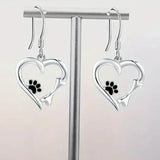 Silver earrings with heart and paw print design