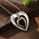 Two-tone heart pendant necklace