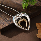 Two-tone heart pendant necklace