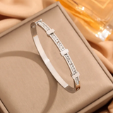 Simple geometric open bracelet with two layers of zircon