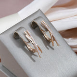 Elegant Gold Cross Earrings