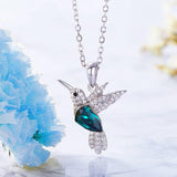 Baby hummingbird necklace with cubic zirconia