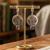 Boho earrings with purple crystals in silver
