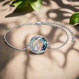 Adjustable silver bracelet with a dog charm