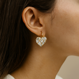 Golden heart-shaped earring with diamond